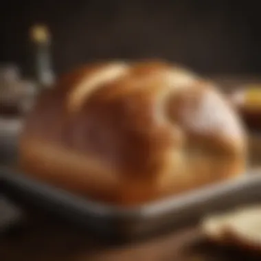 A beautifully baked loaf of bread with a golden crust resting in a pan