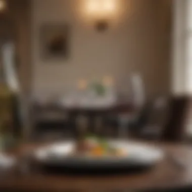Sophisticated Solo Dining Experience An elegant dining setup with a single plate and wine glass