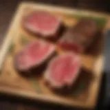 Selection of premium steak cuts displayed on a wooden board