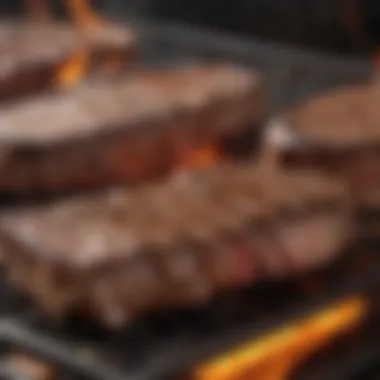 Seared Steaks on Grill Grill with perfectly seared steaks and flames rising