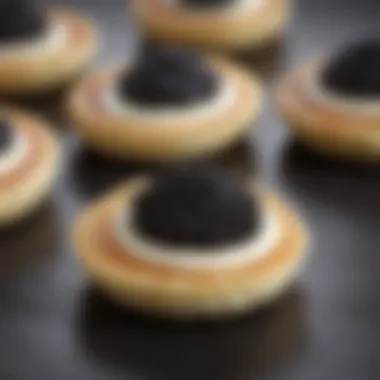 Delicate blinis topped with caviar and crème fraîche