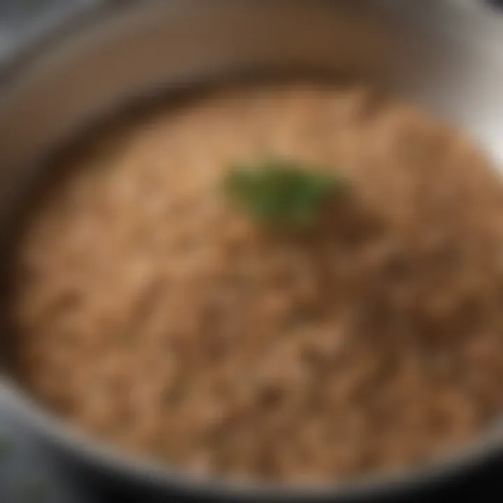 Farro grains simmering in water with herbs