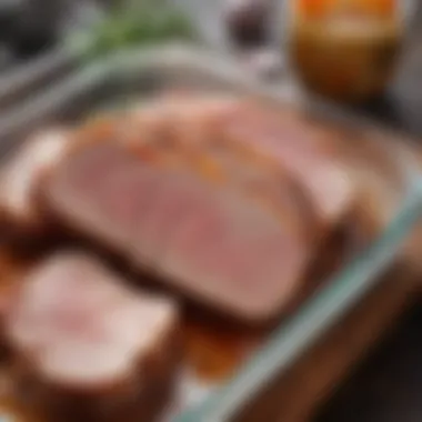 Pork Cuts in Flavorful Marinade Pork cuts marinating in a glass container