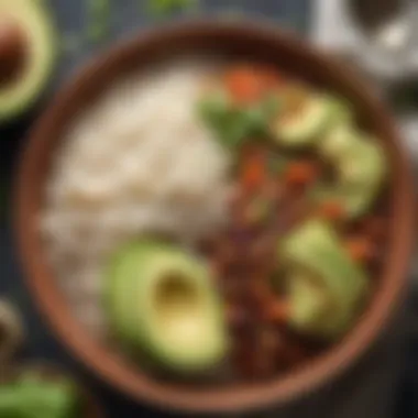 A hearty rice and bean dish garnished with avocado and lime.