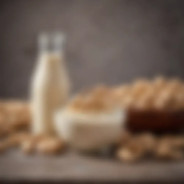 A bowl of cashew nuts with a jar of cashew milk beside it.