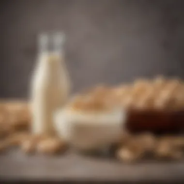 Cashew Nuts and Milk A bowl of cashew nuts with a jar of cashew milk beside it.