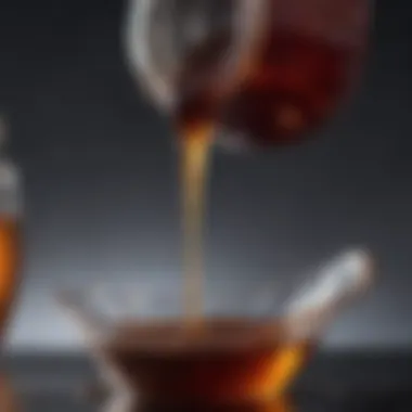 Close-up of extra dark maple syrup being poured