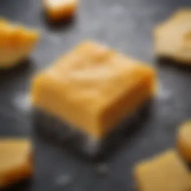 Texture of Thawed Cheddar Cheese A close-up view of thawed cheddar cheese showcasing its texture
