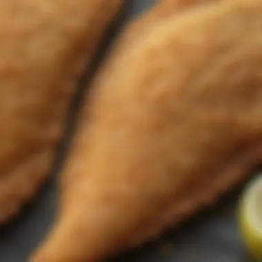 A close-up view of golden-brown breaded flounder showcasing its crispy texture