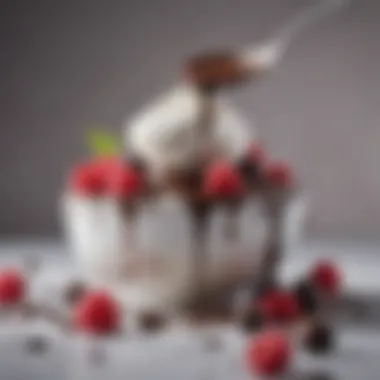 A close-up of dark chocolate being drizzled over a bowl of yogurt and berries