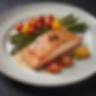 An elegant plated dish featuring grilled salmon with a side of asparagus and cherry tomatoes