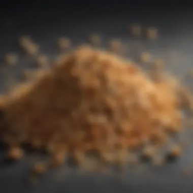 A close-up view of crushed nuts and seeds used as a breadcrumb substitute.