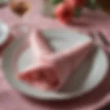 Elegant rose fold napkin displayed on a fine dining table