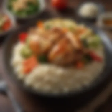 Artistic Presentation of Chicken and Rice A beautifully plated dish of chicken and rice with vibrant vegetables