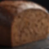A close-up view of pumpernickel bread showcasing its dense texture and rich color