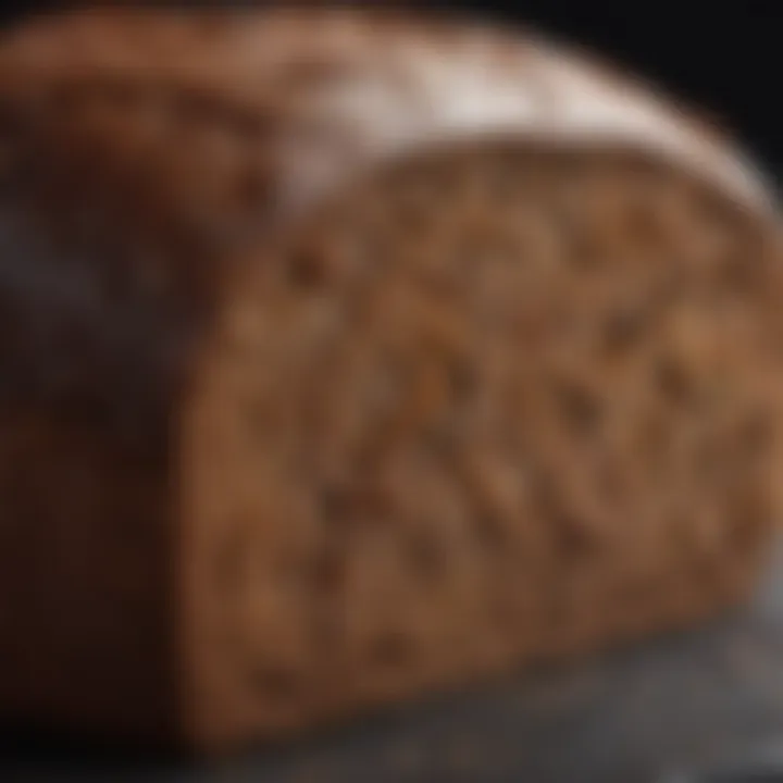 A close-up view of pumpernickel bread showcasing its dense texture and rich color