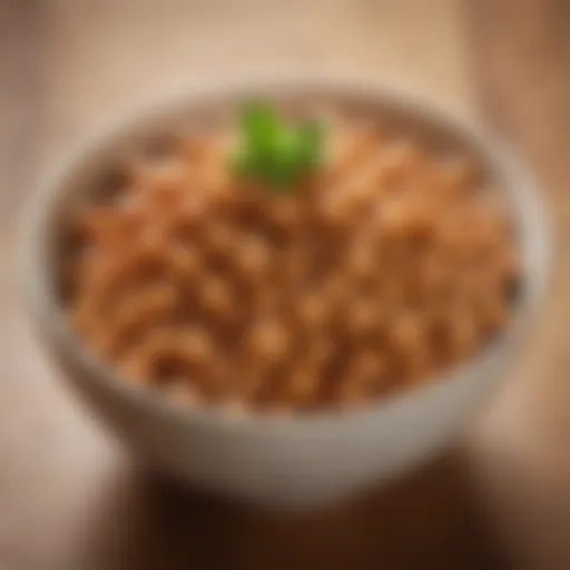 A close-up of a bowl of natto with a rich sticky texture