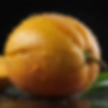 A close-up of a ripe mango with droplets of water, emphasizing its juiciness