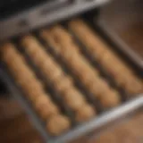 Organized cookie sheet drawer showcasing various baking sheets and pans