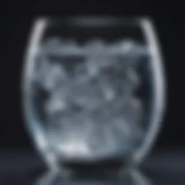 A close-up view of clear mineral water in a glass, reflecting light elegantly.
