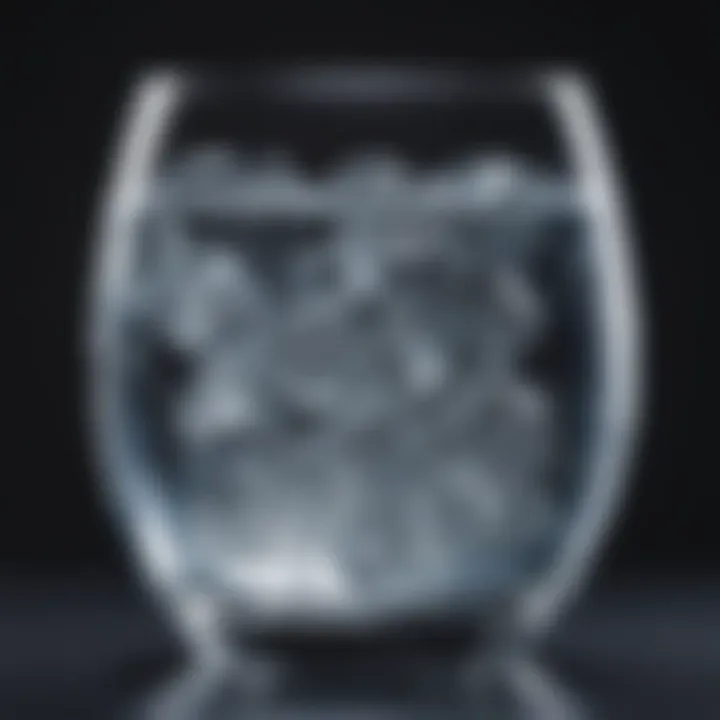 A close-up view of clear mineral water in a glass, reflecting light elegantly.