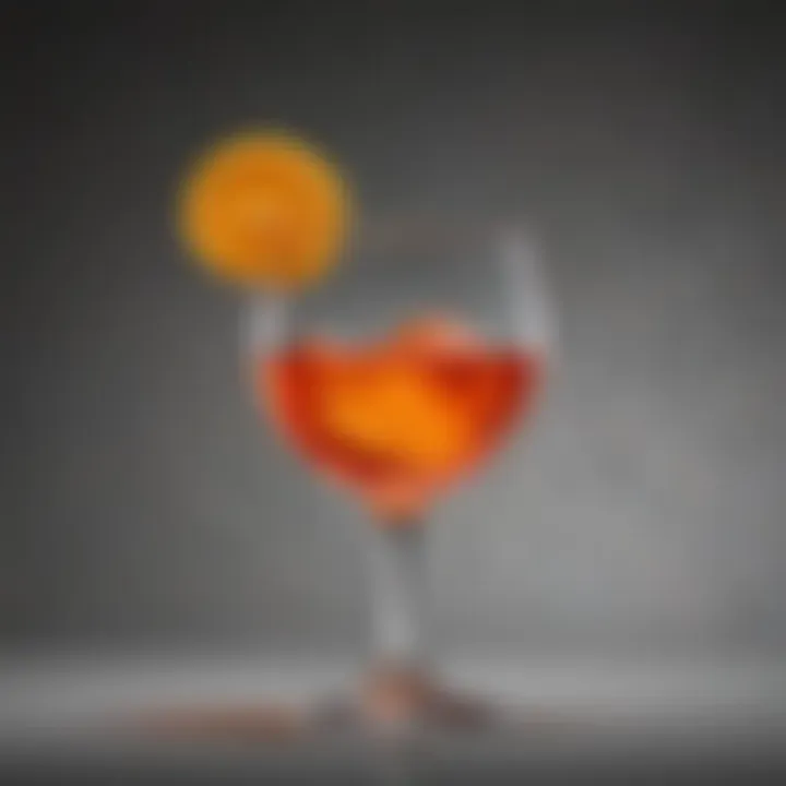 A close-up of Aperol's distinctive orange hue in a cocktail glass