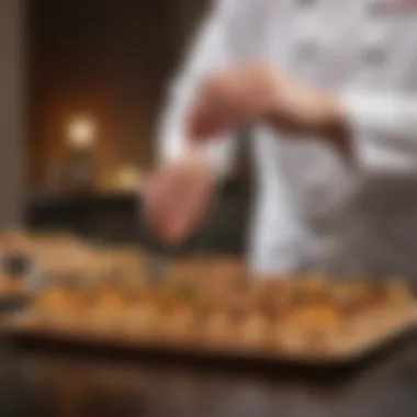 A chef elegantly presenting appetizers in a sophisticated setting