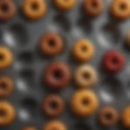 A collection of various mini bundt cake pans showcasing unique designs and materials.