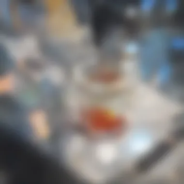 A close-up of vodka pouring into a glass filled with soda