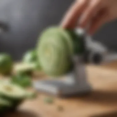 Close-up view of a spiral zucchini slicer in action.