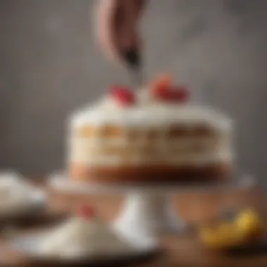 A spatula spreading frosting on a cake