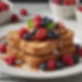 Golden-brown slices of French toast topped with fresh berries