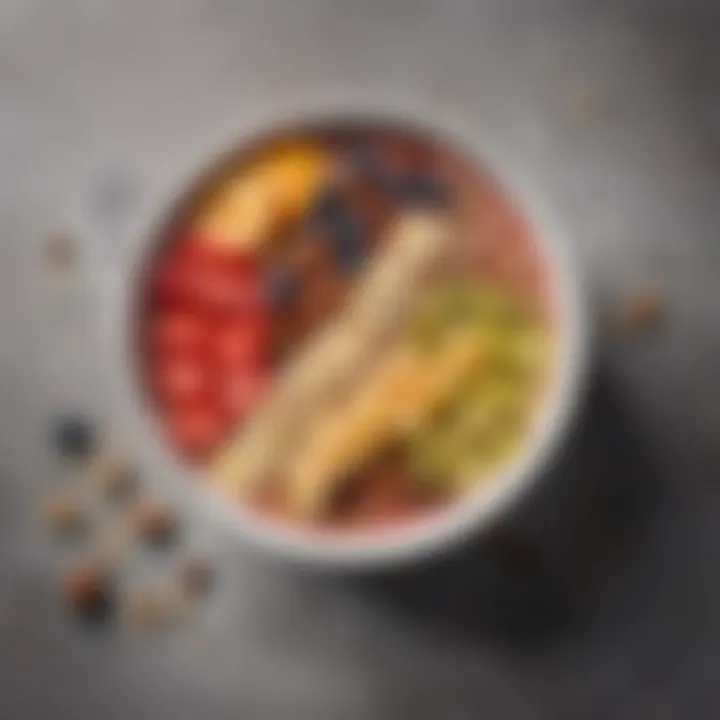 A smoothie bowl topped with fresh fruits and nuts