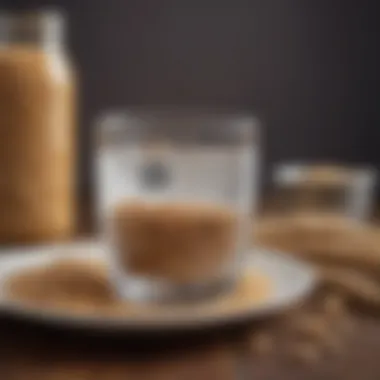 Hydration and Whole Grains A close-up of a glass of water next to a plate of whole grains, emphasizing hydration.