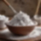 A close-up of powdered sugar in a bowl with a whisk