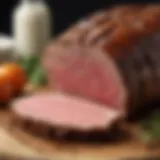 A close-up of a perfectly cooked roast beef sliced to showcase its juicy interior