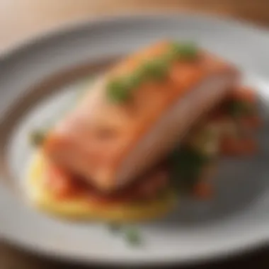 Close-up of a plated salmon dish with garnish