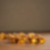 Close-up view of vitamin D capsules on a wooden surface.