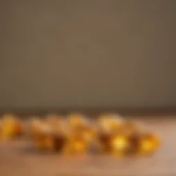 Close-up view of vitamin D capsules on a wooden surface.