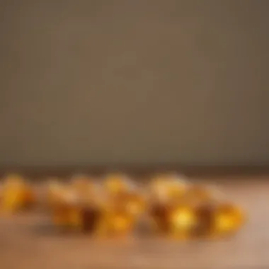 Close-up view of vitamin D capsules on a wooden surface.