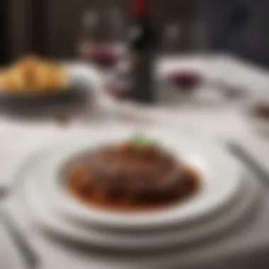 An Elevated Dining Experience An elegant dining table set for a steak dinner, featuring wine glasses and fine cutlery.