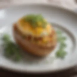 A beautifully plated twice baked potato topped with cheese and herbs