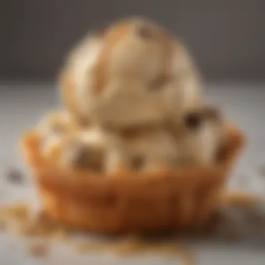 A scoop of cookie dough ice cream in a waffle cone